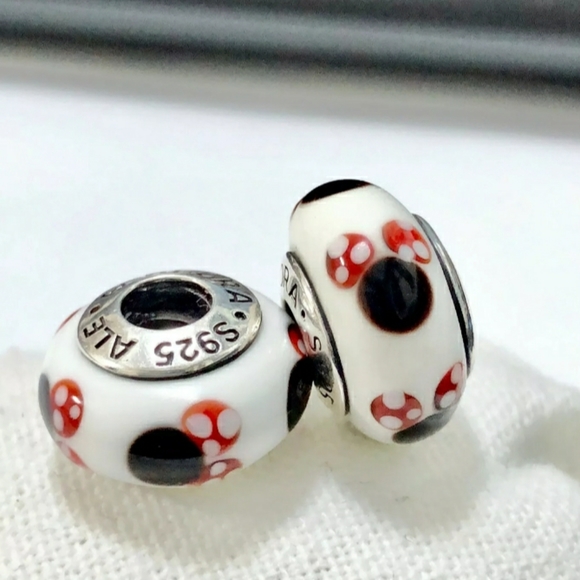 Pandora Jewelry - Pandora pair of classic Minnie Mouse muranos.